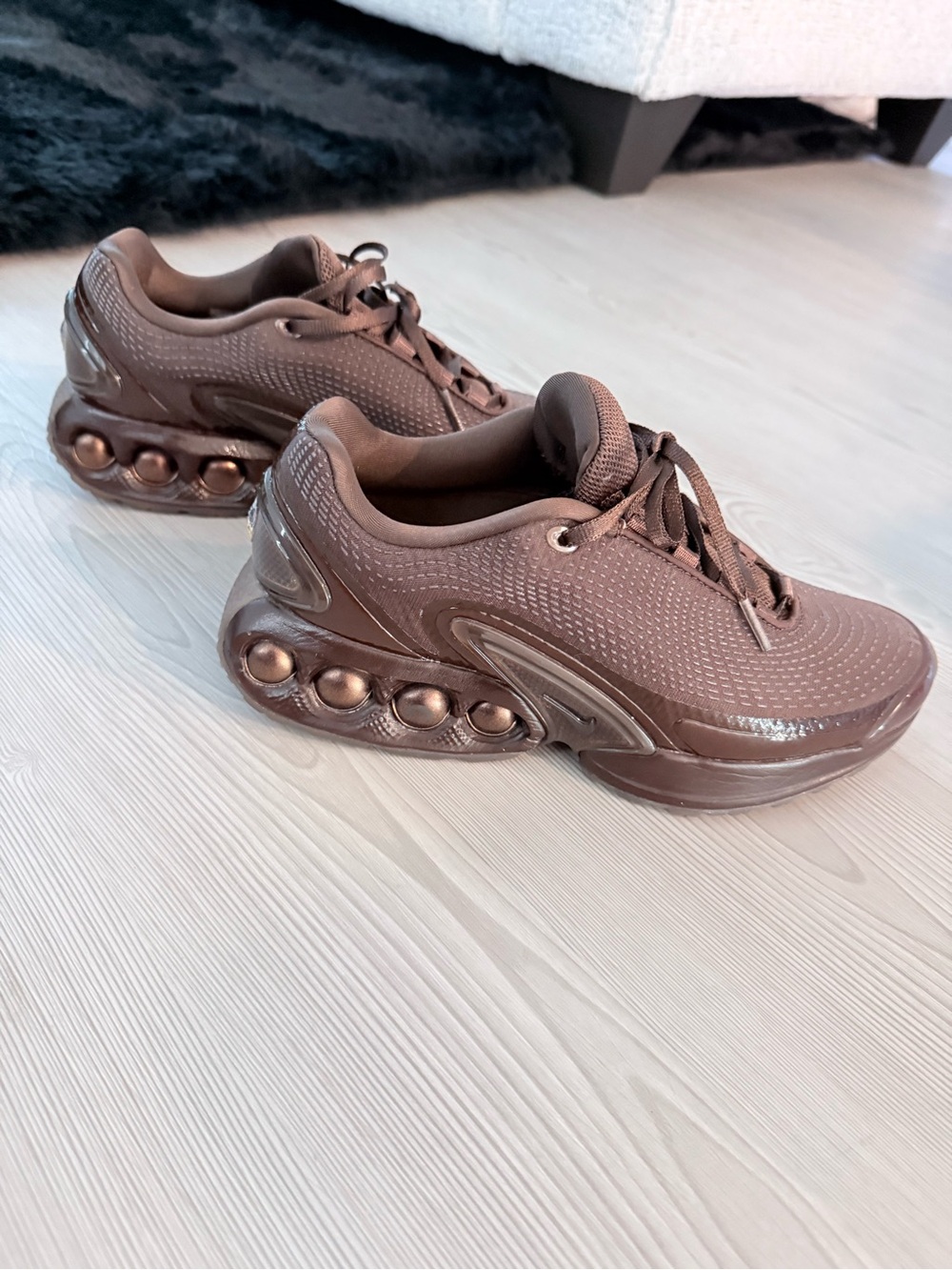 Nike Women’s Brown Athletic Sneakers with Metallic Accents
